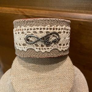 Red leather “Love” cuff